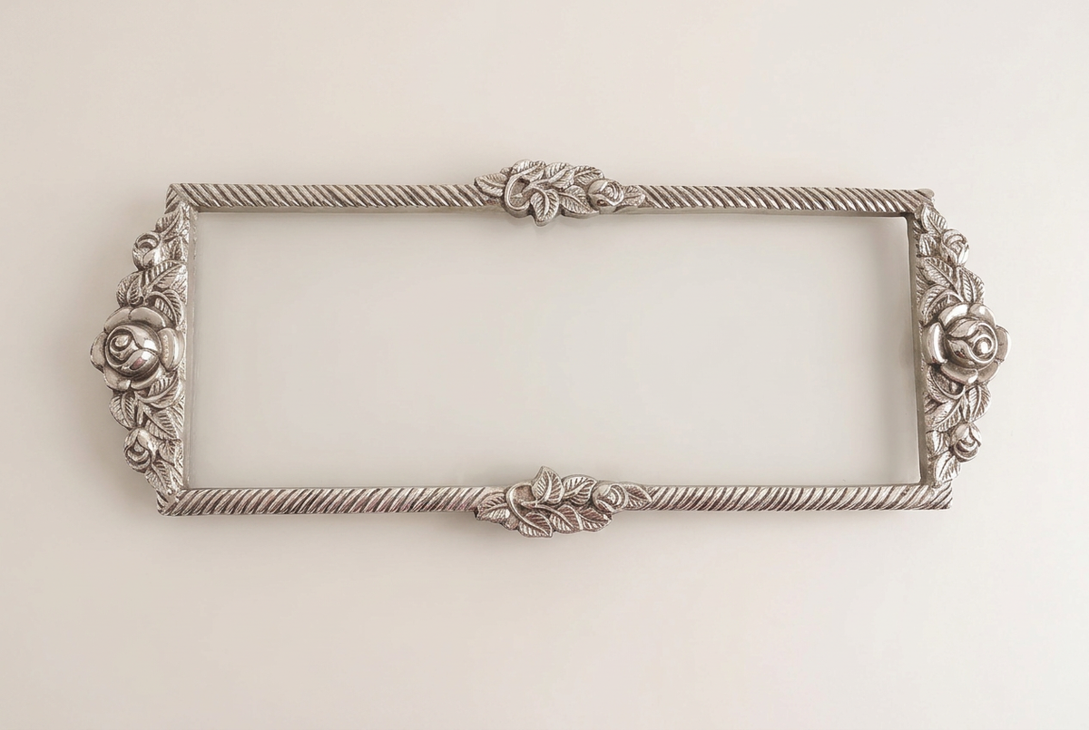 Rose-detail tray on a warm ivory background